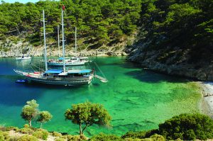 SAILING ON A TRADITIONAL GULET IS THE PERFECT WAY TO ENJOY THE SUMMER WITH YOUR LOVED ONES ON THE SEA AND UNDER THE SUN. FOR THOSE WHO WANT TO FEEL THE LUXURY OF SAILING ON THE TURKISH RIVIERA AND SOAK UP THE SUN AND SEA, TURKEY OFFERS AN AMAZING BLUE VOYAGE ON A TRADITIONAL GULET